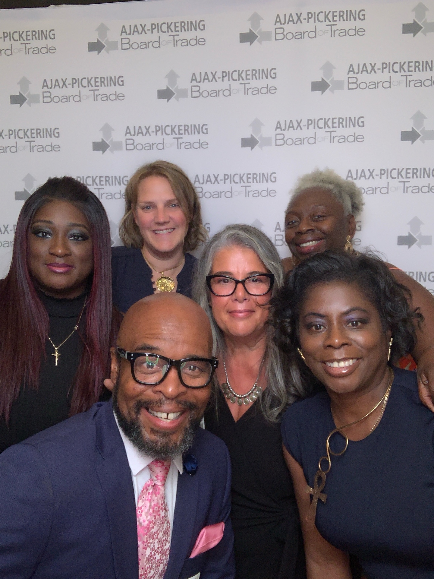 Stacey Lepine-Fisher with community leaders at an Ajax-Pickering Board of Trade event.